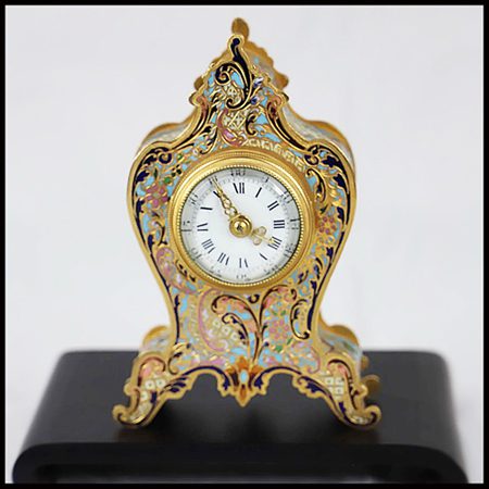 An Antique small small clock. Cloissone antique mantel clock