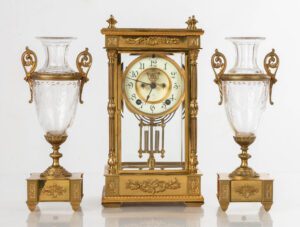 The Ansonia Earl, clock with two urns. Antique clock dealers have the finds. 