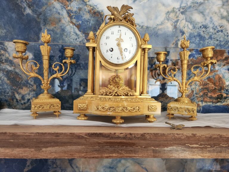An ornate mantel clock by Tiffany.