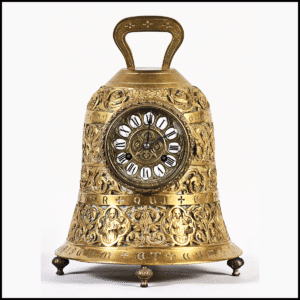 antique mantel clock in shape of a bell