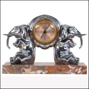 Art Deco vintage clock represented by a vintage small clock by UCRA.