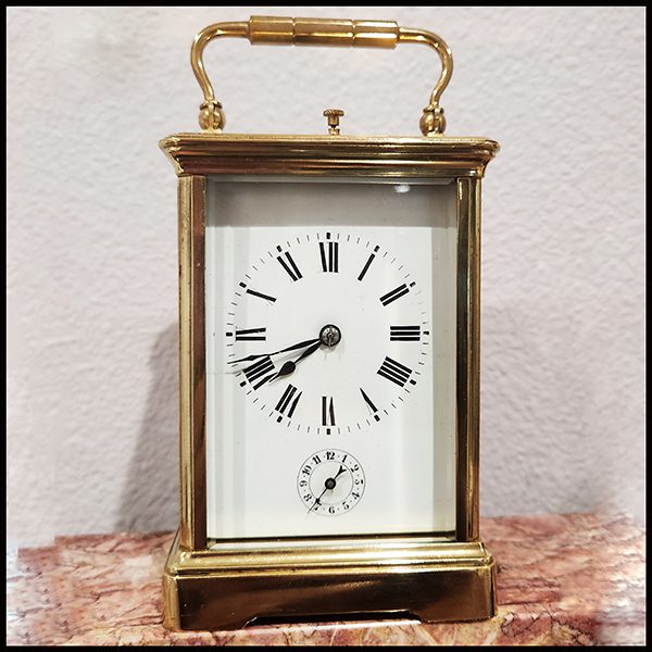 Couaillet repeating carriage clock c1890 is a small example that may be considered an antique shelf clock.